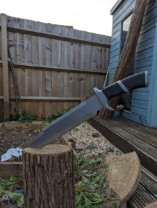 No knife crime here! A photo showing a larger knife being used to garden safely. 